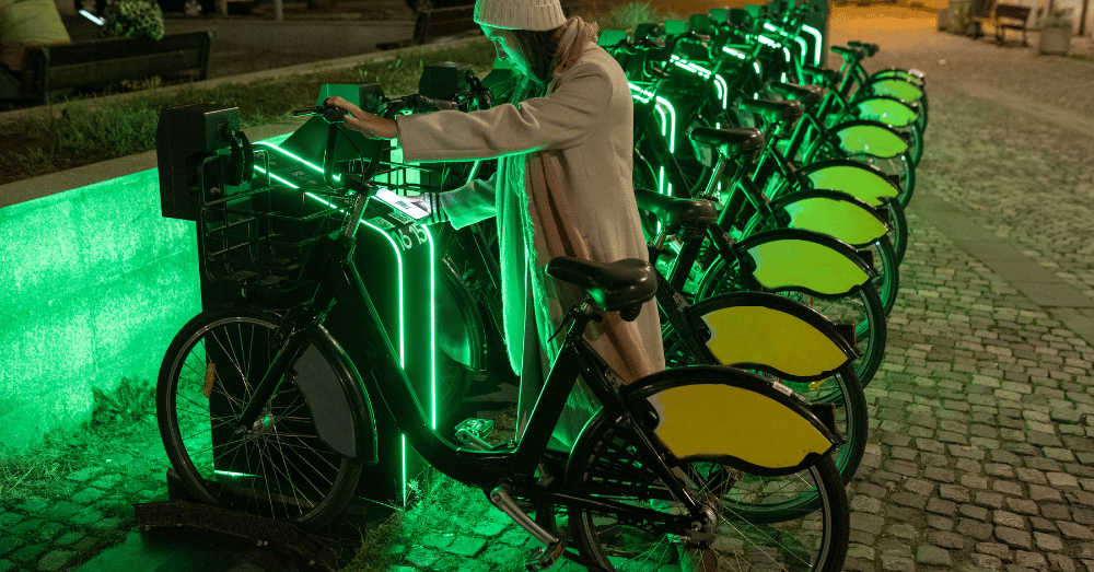 Cities Are Declaring War on E-Bikes - woman checking out an e-bike